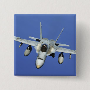 A F/A-18 Hornet participates in a mission 2 Inch Square Button