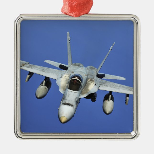 A F/A-18 Hornet participates in a mission Metal Ornament (Front)