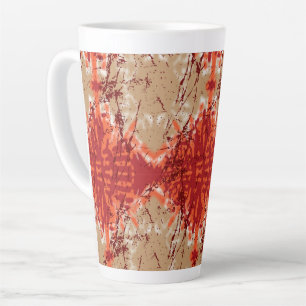 A fabric displaying an orange and brown pattern, latte mug