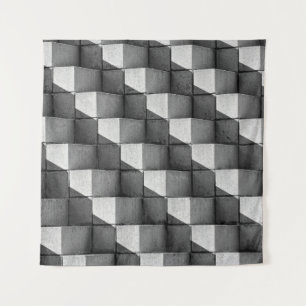 A face of the "Four Sided Pyramid" sculpture in th Tapestry