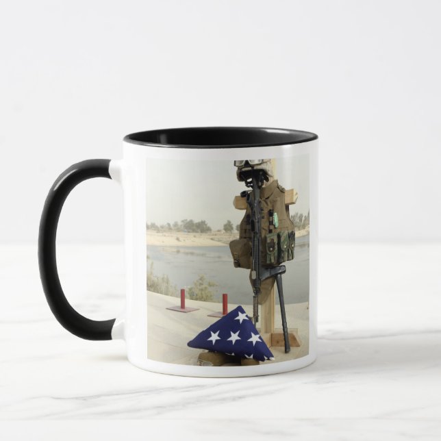 A fallen soldiers gear display mug (Left)