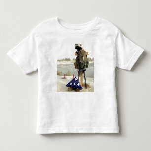 A fallen soldiers gear display toddler t-shirt