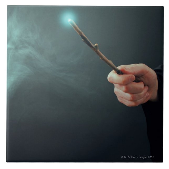 A fantasy wizard making magic with wand. tile (Front)