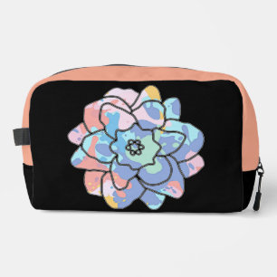 A flower made of paint stains dopp kit