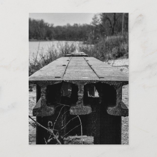 A forgotten old rail seat along a river. postcard (Front)