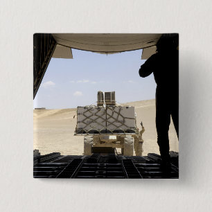 A forklift loads cargo onto a C-130 Hercules 2 Inch Square Button