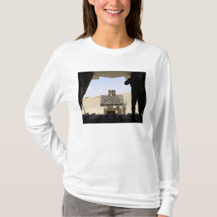 A forklift loads cargo onto a C-130 Hercules T-Shirt