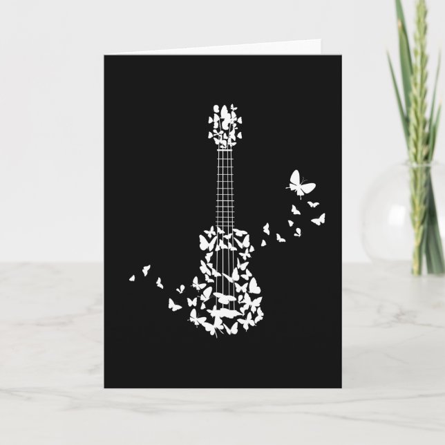 A Four String Ukulele Instrument With Beautiful Card (Front)