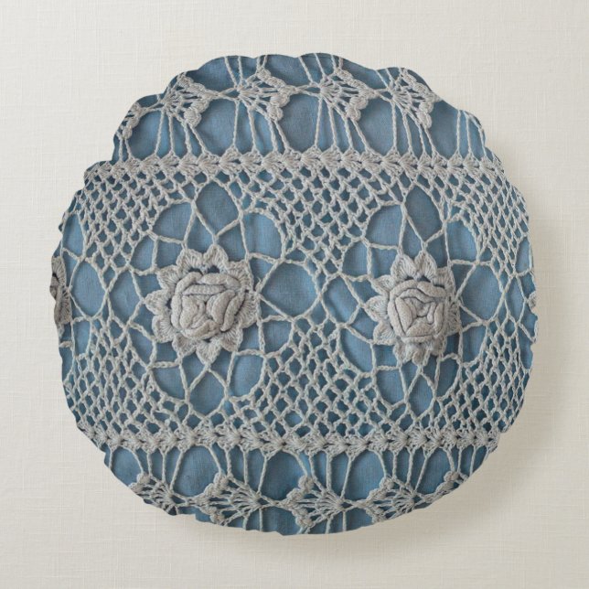 A fragment of a wide lace insert contains small wh round pillow (Front)