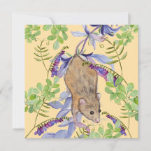 A funny mouse in a thicket of flowers.