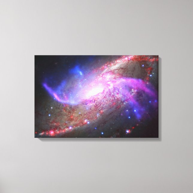 A Galactic Light Show In Spiral Galaxy Ngc 4258. Canvas Print (Front)