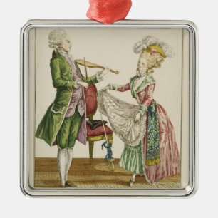 A gentleman playing the violin while a lady dances metal ornament
