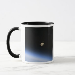 A gibbous moon visible above Earth's atmosphere 2 Mug