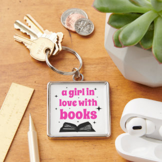A girl in love with books design keychain