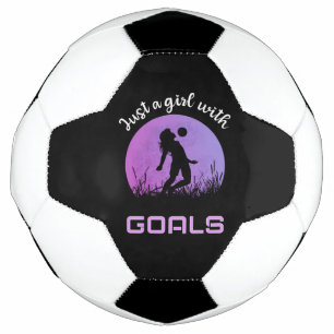 A girl with goals beautiful soccer ball