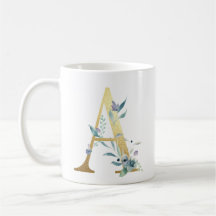 A,  gold initial with blue floral foliage