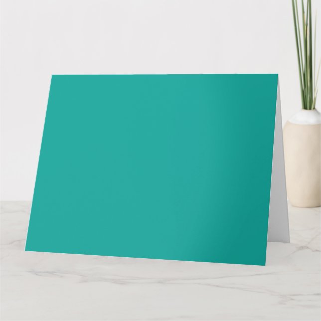 A gradient background blending blue into green. card (Front)