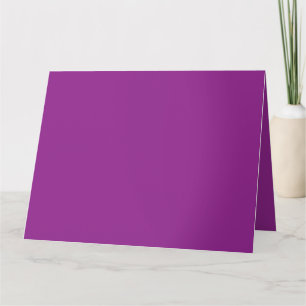 A gradient background blending shades of pink and card