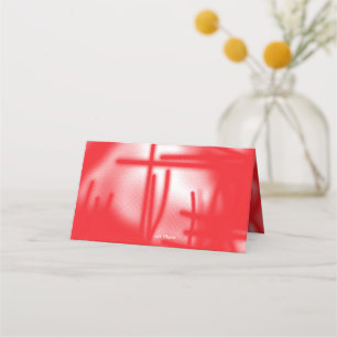 A graphic design featuring bold red and orange sha place card