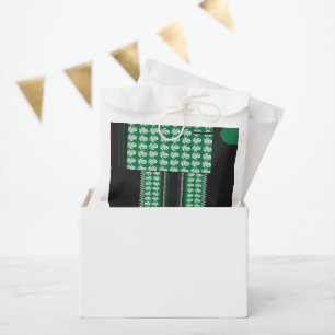 a green and black pattern with a tree in the middl favour bag