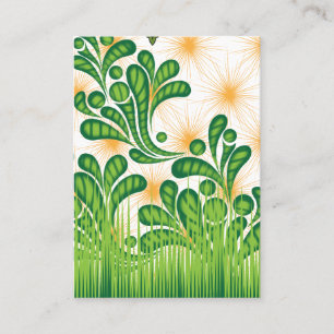 A green and gold artistic pattern depicting a tree business card
