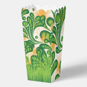 A green and gold artistic pattern depicting a tree favor box