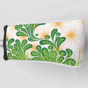 A green and gold artistic pattern depicting a tree golf head cover