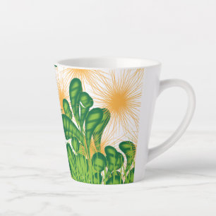 A green and gold artistic pattern depicting a tree latte mug