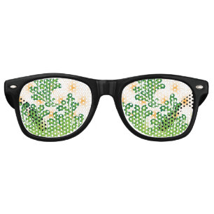 A green and gold artistic pattern depicting a tree retro sunglasses