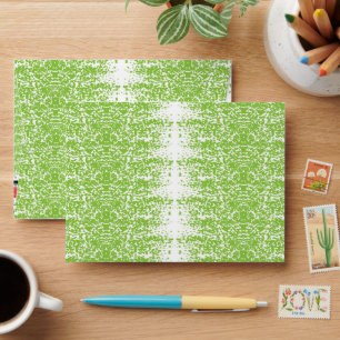 a green and white background with small dots envelope