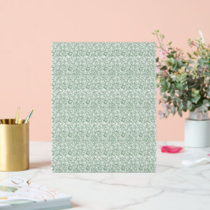 a green and white background with small leaves acrylic sign