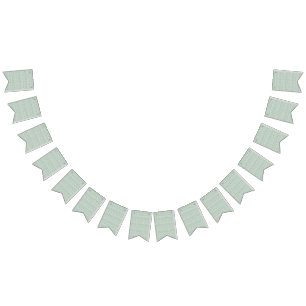 a green and white background with small leaves bunting flags