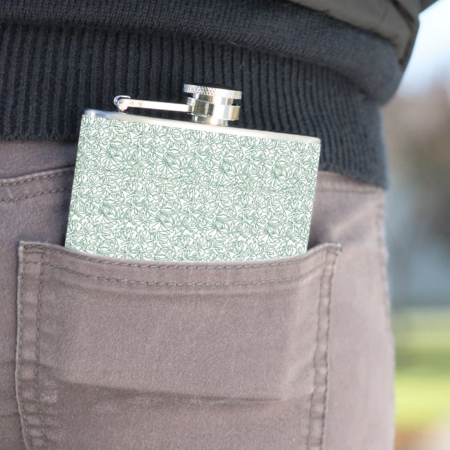 a green and white background with small leaves hip flask (In Situ)