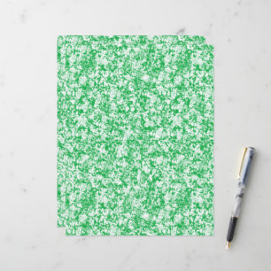 a green and white background with small white dots