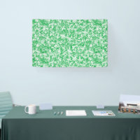 a green and white background with small white dots