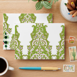 a green and white wallpaper with ornate designs envelope