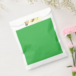 a green background with a white border favour bag