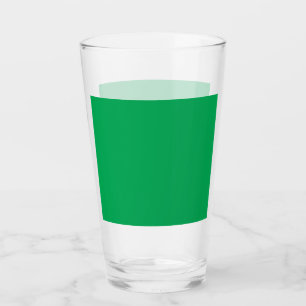 a green background with a white border glass