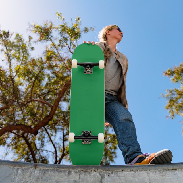 a green background with a white border skateboard (Outdoor 1)