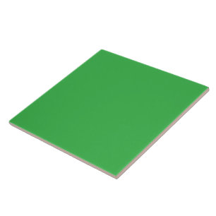a green background with a white border tile