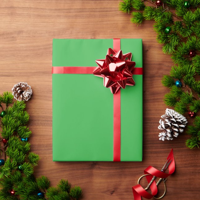 a green background with a white border wrapping paper (Holiday Gift)
