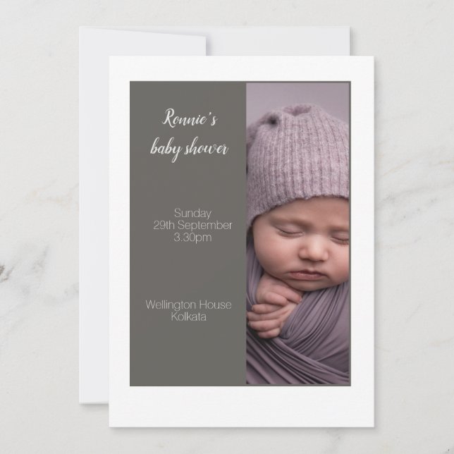 A grey coloured baby shower invitation card (Front)