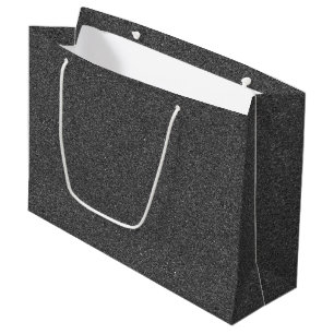 A grey gift bag with white rope handles