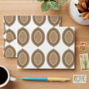 a group of brown circles on a white background envelope