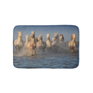 A Group Of White Horses In The Camargue Region Bath Mat