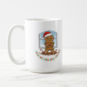A grumpy gingerbread man coffee mug
