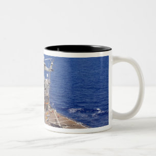 A helicopter clears the flight deck Two-Tone coffee mug