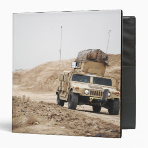 A Humvee conducts security Binder