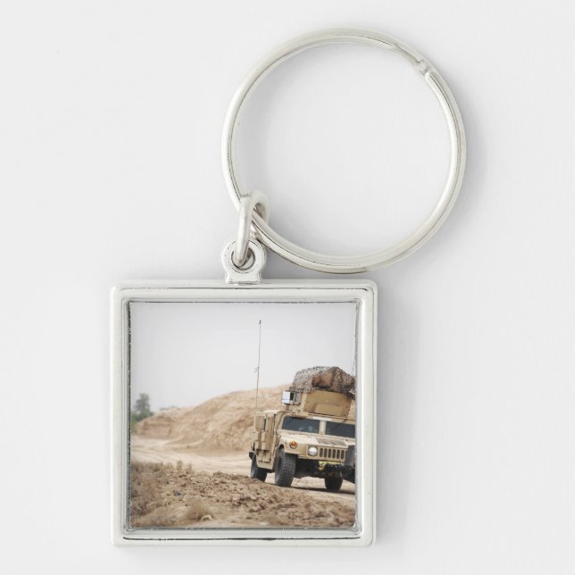 A Humvee conducts security Keychain (Front)