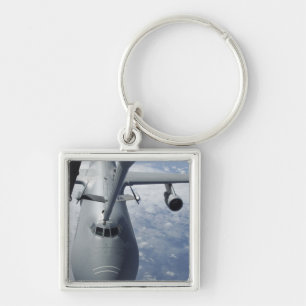 A KC-10 Extender prepares to refuel a C-5 Galax Keychain